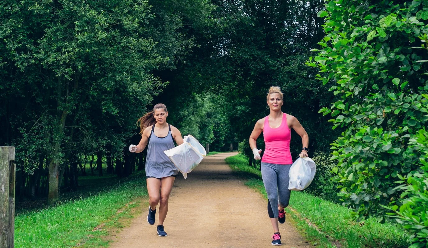 People plogging and collecting waste